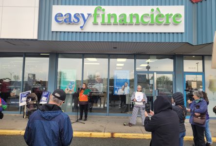 Protesters rally outside easyfinancière in opposition to predatory lending